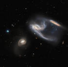 Hubble detecta un par galáctico en forma de nave estelar